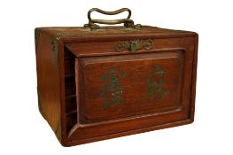 A Chinese bone and bamboo mahjong set in brass mounted hardwood case, width 23cm.