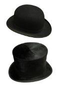 A gentleman’s top hat in original case and a Bowler hat retailed by Dunn & Co