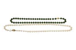 A single strand cultured pearl necklace, with a cultured pearl set 9ct gold clasp, 56cm, together