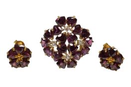 A recent 9ct gold, garnet and simulated diamond cluster dress ring, size N and pair of similar 375
