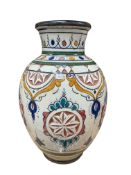 A Moroccan glazed pottery vase, height 30cm.