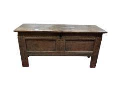 A 17th century panelled oak coffer, width 111cm, depth 39cm, height 55cm