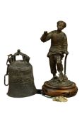 A Chinese archaistic bronze bell, height 18cm and a spelter figure of a scholar (2)