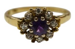 An 18ct gold, amethyst and diamond set cluster ring, size K/L, gross weight 2.8 grams.