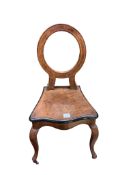 A 19th century Continental walnut hall chair with hinged box seat, width 47cm, depth 43cm, height