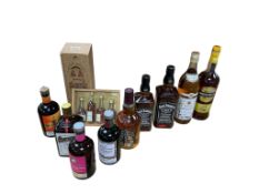 A bottle of Keo Old Pale Brandy, two bottles of Jack Daniel’s Whiskey, a bottle of Cardenal
