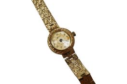 A lady's 9ct gold manual wind wrist watch, retailed by Asprey, with Arabic dial, case diameter 15mm,