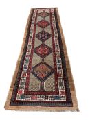 A Turkish multi-coloured runner, 325 x 92cm