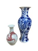 A Chinese blue and white baluster vase and smaller underglaze copper-red vase, largest 26cm high