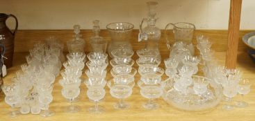 A suite of Edinburgh crystal thistle pattern glass, approximately 70 pieces to include a claret jug,