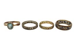 Three assorted 9ct gold and simulated diamond set full eternity rings and a George V 9ct gold and