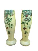 A pair of French enamelled yellow glass vases, signed Leg, 28cm high