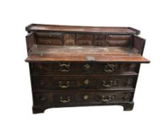 An 18th century Dutch oak escritoire, width 152cm, depth 64cm, height 106cm
