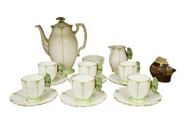 An Aynsley porcelain fifteen piece butterfly handle coffee set, gilt green and white glazed,