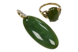 A recent nephrite pendant with 9ct gold and seven stone diamond set bale, overall 45mm, together
