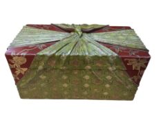 A Japanese lacquered pen box, of rectangular form, decorated in red and green lacquer with gilt.