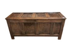 An 18th century oak coffer, width 140cm, depth 50cm, height 63cm