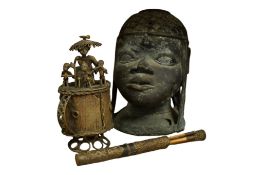 A Yoruba Benin style bronze head, height 26cm, a similar jar and cover and a set of cased implements