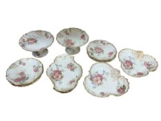 A Limoges floral part dessert service, largest 30cm wide