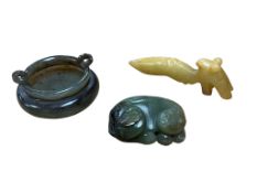 A Chinese green and black jade figure of a cat and butterfly, a similar tripod censer and a