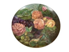 A Howell and James charger, handpainted with fruit and roses, signed E. Holland, dated 1881 to the