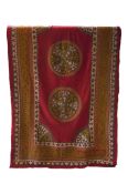 A late 19th century Uzbekistan or Tajikistan coloured heavy wool and silk embroidered Suzani wall