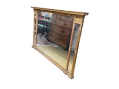 A George III style giltwood and composition overmantel mirror, width 131cm, height 84cm