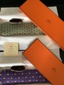 Two boxed Hermes, Paris, gentlemen’s silk ties, from their official creative themes; 2001 “Looking