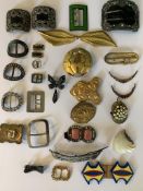 A collection of 19th and 20th century decorative belt and shoe buckles. To include a green enamel