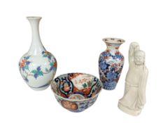 A group of Japanese and Chinese ceramics, comprising a Japanese vase, an Imari vase and bowl, and