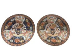 A pair of decorative Imari chargers, diameter 46cm.