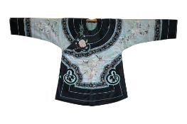 A 20th century Chinese ladies silk jacket. Embroidered with silk pastel coloured birds, blossom