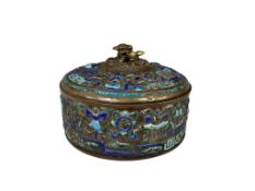 A Chinese enamelled copper circular box with lion dog finial, 20th century, diameter 14cm.