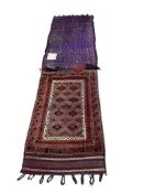 Two North West Persian bag faces and a Turkish red ground rug, largest 217 x 64cm