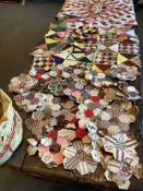 An interesting invaluable and useful collection of patch works. The fabrics mostly Victorian and