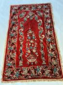 A 19th century Turkish Ottoman red wool prayer Hanging. Worked in polychrome silks, embroidered in