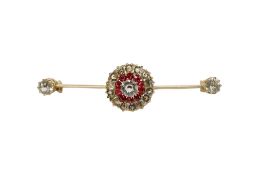 An unmarked yellow metal and red and colourless paste cluster set bar brooch, 44mm.