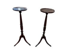 A pair of mahogany torcheres, diameter 28cm, height 89cm