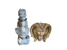 A stone dragon, height 78cm and a green man mask