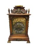 An oak cased bracket clock, the movement stamped Japy Freres, with silvered dial, striking on a