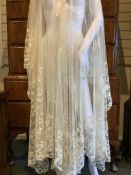For the attention of wedding dress designers. A large late 19th century ornately decorated