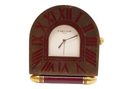 A Cartier brass arched desk clock, 357202729, 6cm high