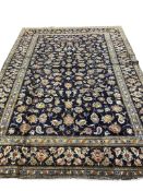 A Kashan blue ground carpet, 303 x 218cm