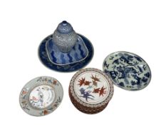 A collection of 19th century and later Chinese and Japanese ceramics to include a famille rose dish,