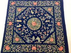 A large 19th Century Chinese blue felt silk embroidered hanging. The embroidery designed with an