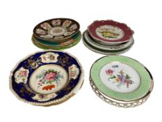 Seventeen English porcelain flower and fruit decorated plates and dishes, mainly 19th century,
