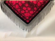 A large silk embroidered Chinese shawl, decorated with an array of deep pink embroidered flowers