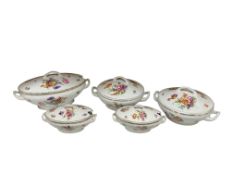 Five Czechoslovakian oval porcelain tureens with printed floral decoration, largest 30cm wide.