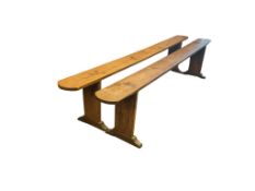 A pair of 19th century French fruitwood farmhouse benches, length 251cm, depth 35cm, height 52cm