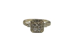 A modern 9ct gold and diamond set square cluster ring, with diamond set shoulders, size M, gross